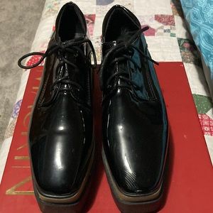 Black Oxford platforms
